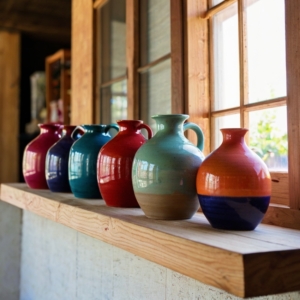 Pottery on a wooden shelf